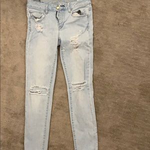 Skinny light wash distressed jeans